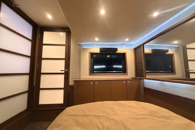 Slide: The Image of Luxurious interior of 2016 Sea Ray Sundancer 540 yacht with TV and modern decor. - 81