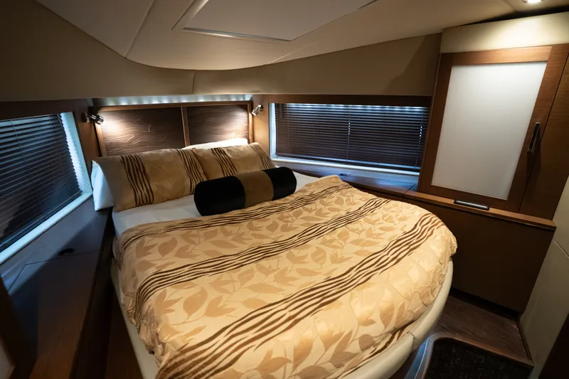 Slide: The Image of Luxurious bedroom interior of 2016 Sea Ray Sundancer 540 yacht with elegant bedding. - 71