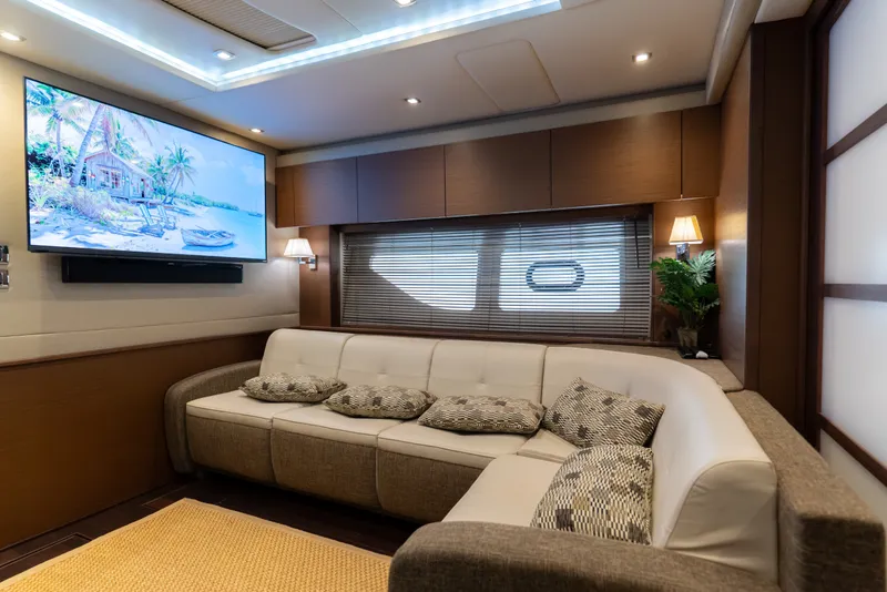 Slide: The Image of Luxurious interior of 2016 Sea Ray Sundancer 540 yacht with modern decor and large TV. - 62