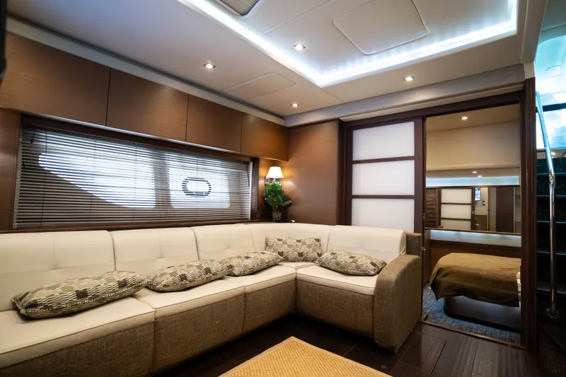 Slide: The Image of Luxurious interior of 2016 Sea Ray Sundancer 540 yacht with modern seating and ambient lighting. - 63