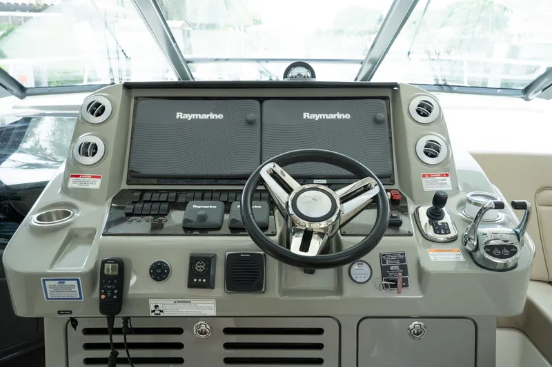 Slide: The Image of Control panel of a 2016 Sea Ray Sundancer 540 yacht with Raymarine navigation systems. - 24