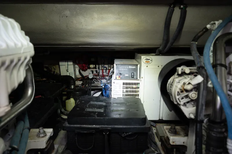 Slide: The Image of Engine room of 2016 Sea Ray Sundancer 540 with Cummins Onan generator. - 94