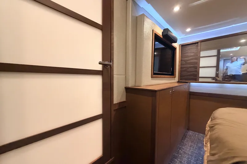 Slide: The Image of Interior of 2016 Sea Ray Sundancer 540 yacht with modern wood cabinetry and sleek design. - 86
