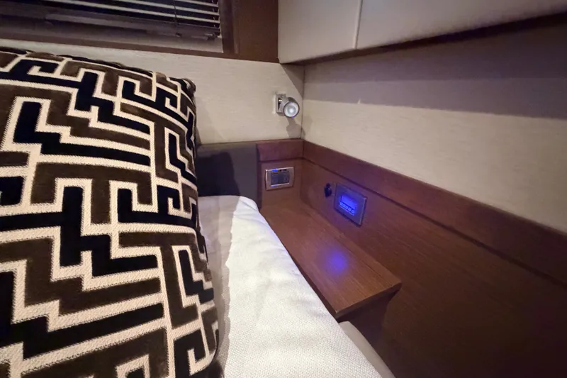 Slide: The Image of Interior of 2016 Sea Ray Sundancer 540 with geometric pillow and ambient lighting. - 78