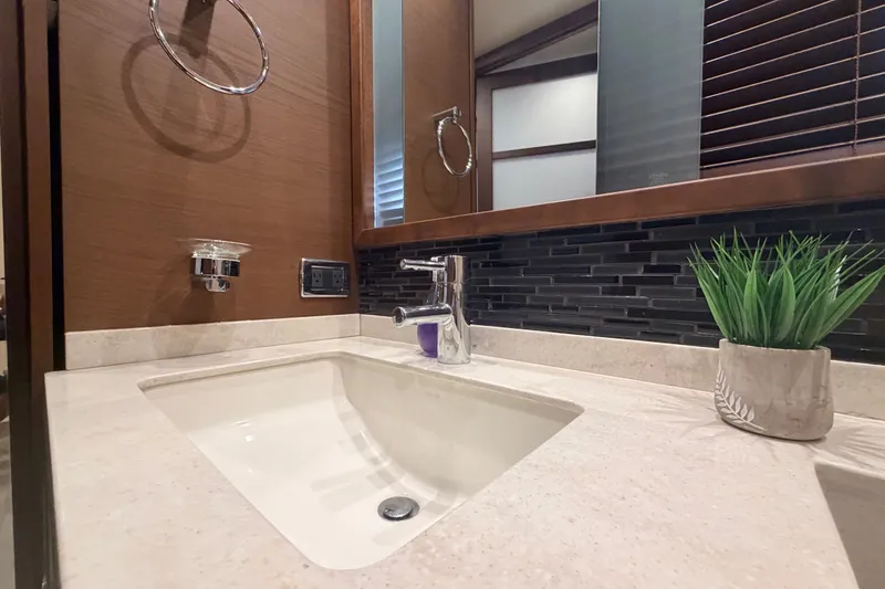 Slide: The Image of Luxurious bathroom sink in 2016 Sea Ray Sundancer 540 yacht with modern fixtures and decor. - 72