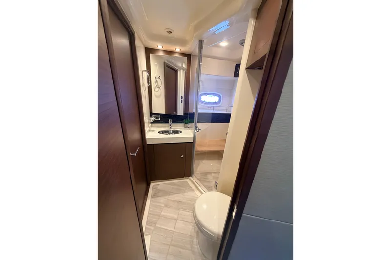 Slide: The Image of Luxurious bathroom in 2016 Sea Ray Sundancer 540 yacht with modern fixtures and elegant design. - 80