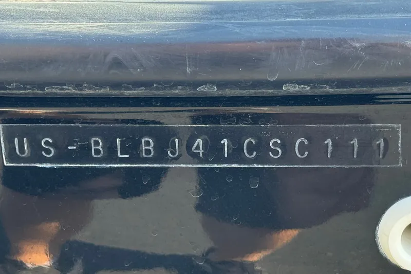 Slide: The Image of Hull identification number on a 2011 Bayliner 185 Bowrider boat. - 26