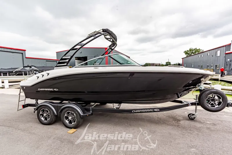 Slide: The Image of 2025 Chaparral 21 SSi boat on trailer at Lakeside Marina. - 2