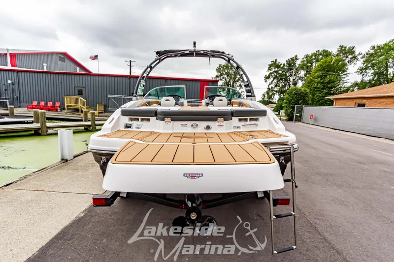 Slide: The Image of 2025 Chaparral 21 SSi boat at Lakeside Marina, rear view with swim platform. - 6