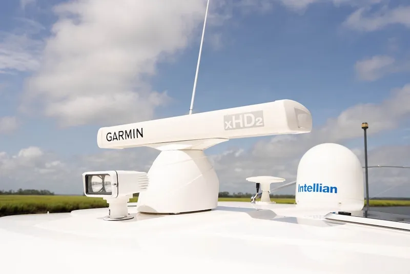 Slide: The Image of Garmin xHD2 radar and Intellian dome on 2015 Pursuit OS 385 Offshore boat. - 22