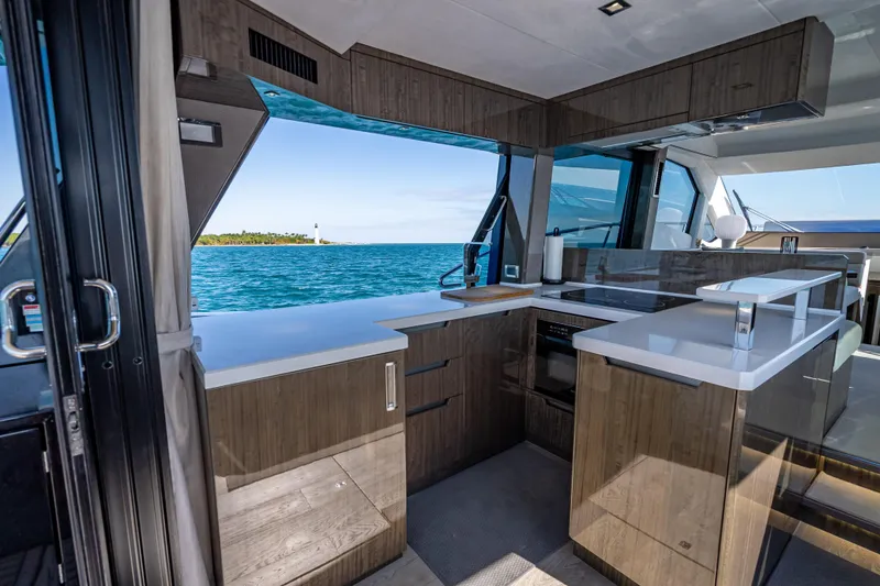 Slide: The Image of Modern kitchen interior of 2021 Galeon 500 Fly yacht with ocean view. - 46