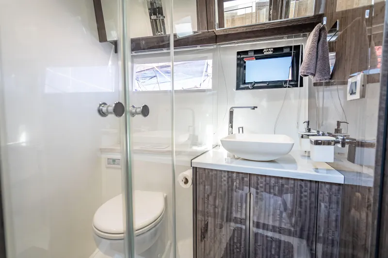 Slide: The Image of Luxurious bathroom in 2021 Galeon 500 Fly yacht with modern fixtures and elegant design. - 25