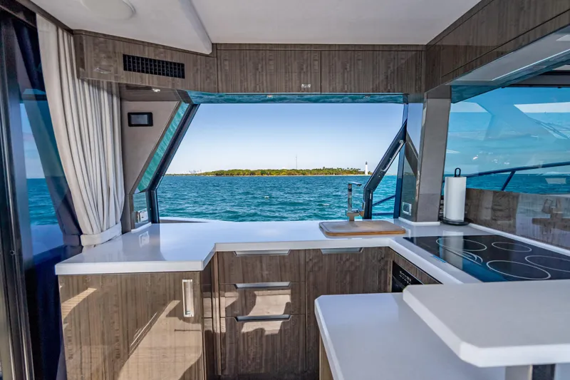 Slide: The Image of Modern kitchen interior on 2021 Galeon 500 Fly yacht with ocean view. - 47
