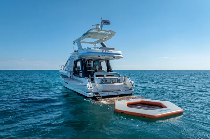 Slide: The Image of 2021 Galeon 500 Fly yacht on open sea with floating platform. - 62