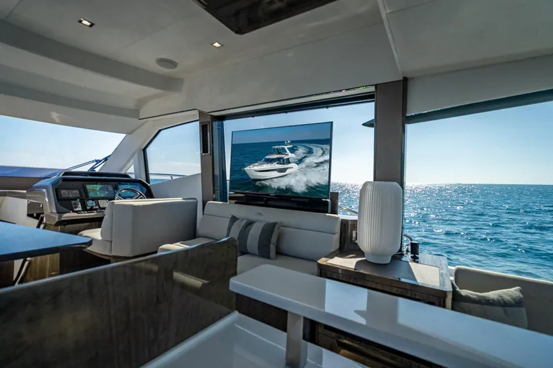 Slide: The Image of Luxurious interior of 2021 Galeon 500 Fly yacht with ocean view and modern amenities. - 44