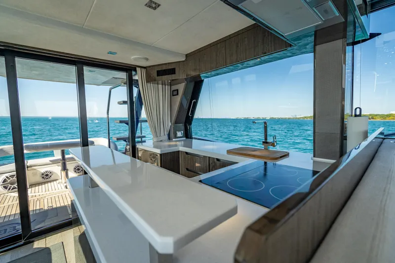 Slide: The Image of Luxurious 2021 Galeon 500 Fly yacht interior with modern kitchen and ocean view. - 37
