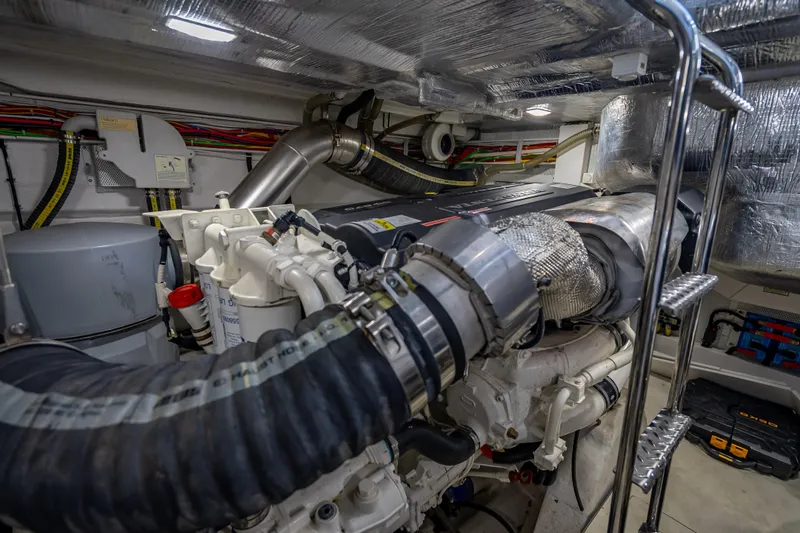 Slide: The Image of Engine room of 2021 Galeon 500 Fly yacht with visible machinery and components. - 56