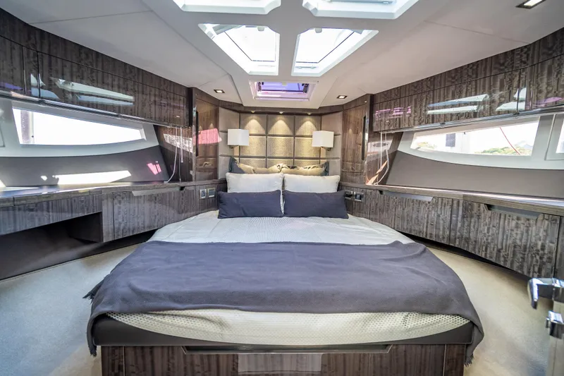 Slide: The Image of Luxurious bedroom interior of 2021 Galeon 500 Fly yacht with modern design and skylights. - 22