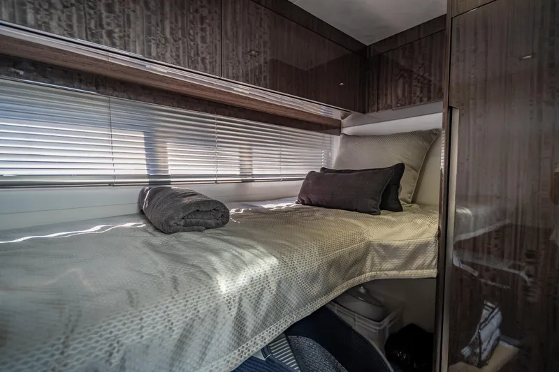 Slide: The Image of Luxurious cabin interior of 2021 Galeon 500 Fly yacht with cozy bedding. - 29