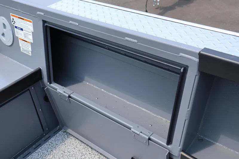 Slide: The Image of Storage compartment on a 2026 Alumaweld Columbia 21 boat, featuring a durable metal finish. - 8