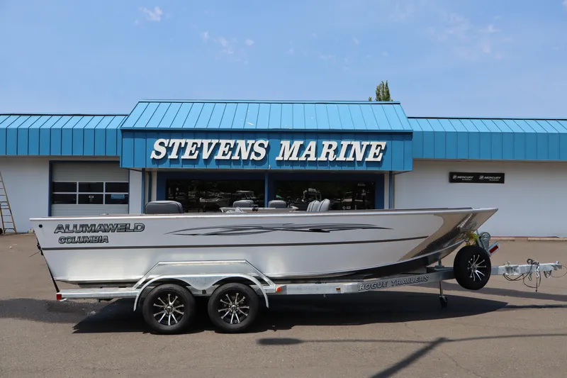 The Image of 2026 Alumaweld Columbia 21 boat on trailer at Stevens Marine dealership. - 1