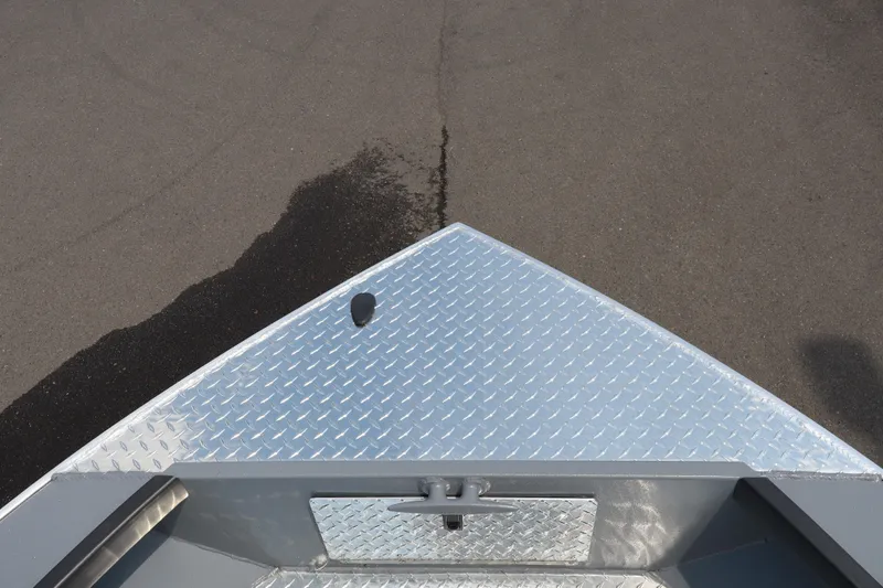 Slide: The Image of Bow of 2026 Alumaweld Columbia 21 boat with diamond plate deck. - 19