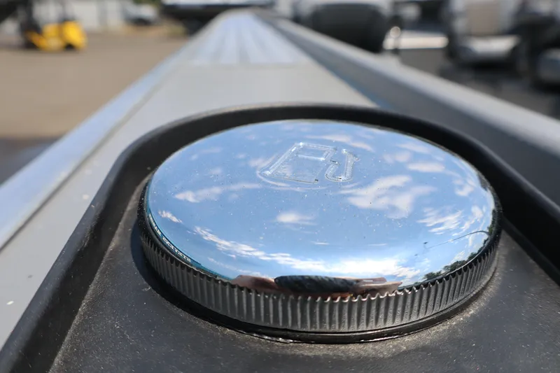Slide: The Image of Close-up of a shiny fuel cap on a 2026 Alumaweld Columbia 21 boat. - 7