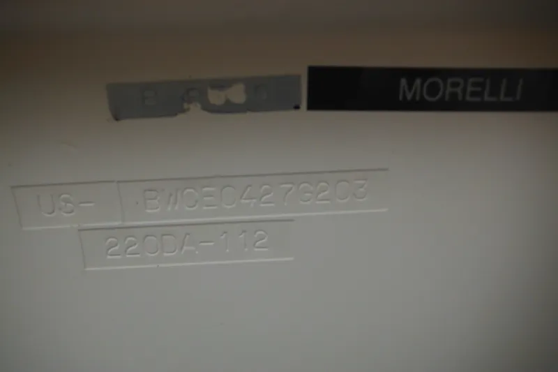 Slide: The Image of Hull identification number on a 2003 Boston Whaler 220 Dauntless boat. - 12