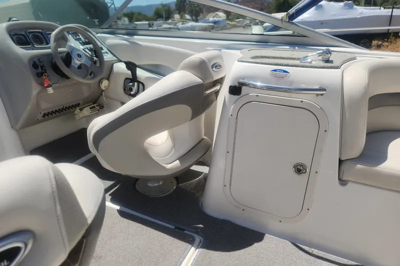 Slide: The Image of Interior of 2008 Chaparral 246 SSi boat with steering wheel and seating. - 3