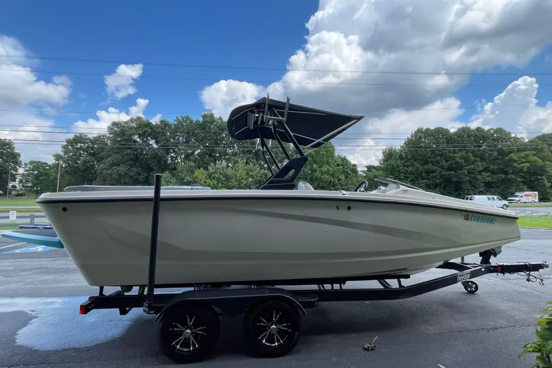 Slide: The Image of 2017 Heyday WT-2 boat on trailer under cloudy sky. - 7