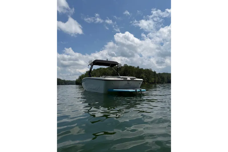 Slide: The Image of 2017 Heyday WT-2 boat on a calm lake under a partly cloudy sky. - 18