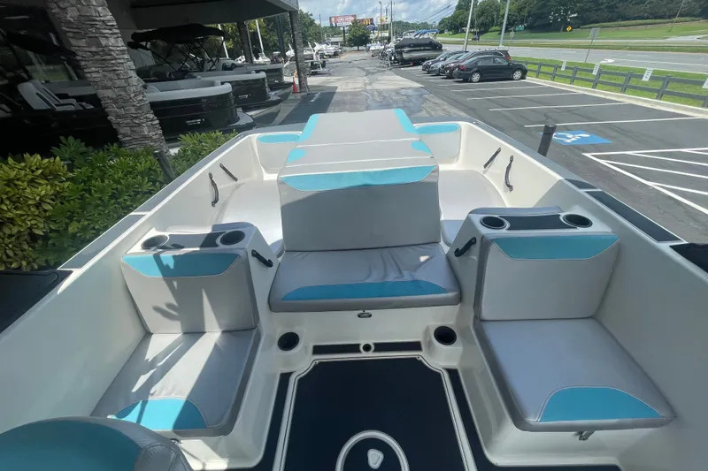 Slide: The Image of Interior of a 2017 Heyday WT-2 boat with blue and gray seating. - 12