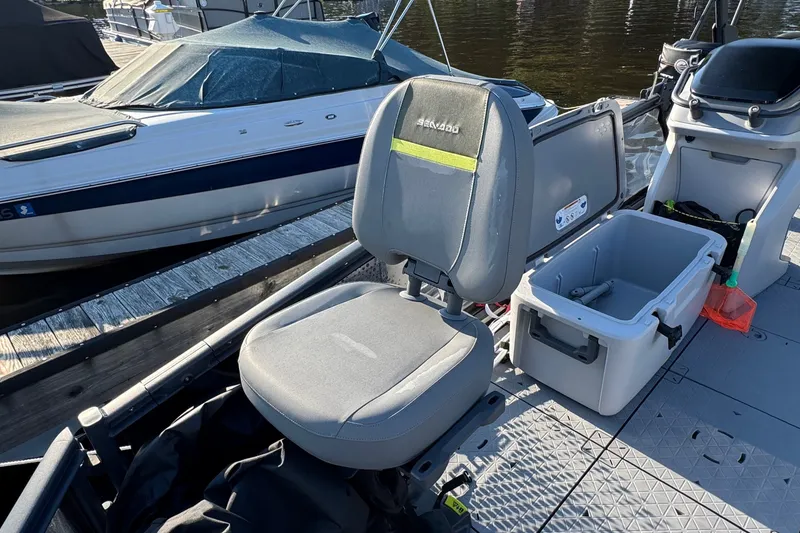 Slide: The Image of 2025 Sea-Doo Switch Fish 21 boat interior with seating and storage compartments. - 3