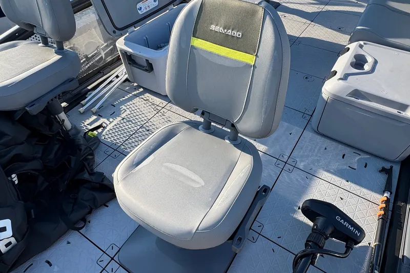 Slide: The Image of 2025 Sea-Doo Switch Fish 21 interior with comfortable seating and Garmin equipment. - 4