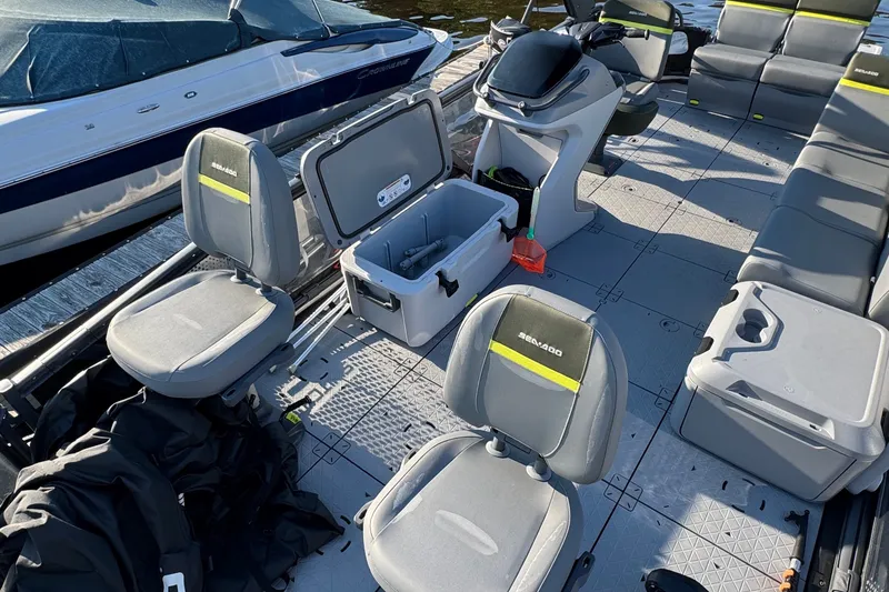 Slide: The Image of 2025 Sea-Doo Switch Fish 21 interior with seating and storage compartments. - 6