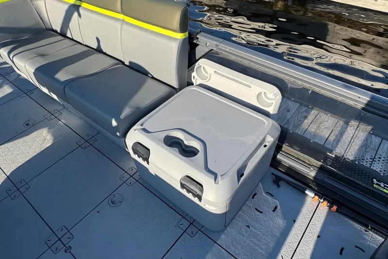 Slide: The Image of 2025 Sea-Doo Switch Fish 21 interior with seating and storage compartment. - 8
