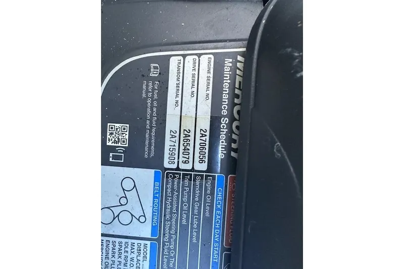 Slide: The Image of 2022 Sea Ray SPX 210 maintenance schedule label with serial numbers and QR code. - 22