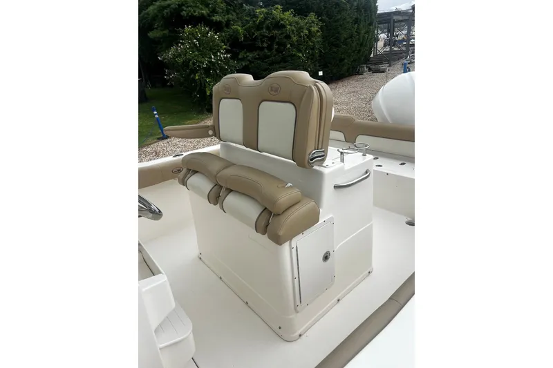 Slide: The Image of 2019 Key West 239 FS boat interior with tan and white seating. - 6