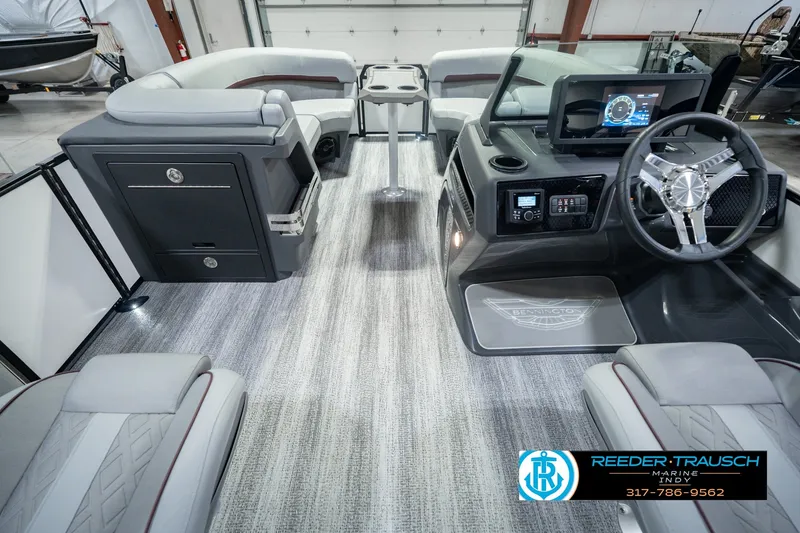 Slide: The Image of Interior of 2027 Bennington 22 MSB boat with modern dashboard and seating. - 24