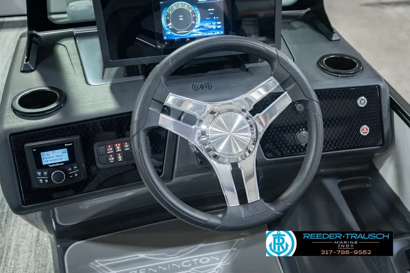 Slide: The Image of Steering console of 2027 Bennington 22 MSB with modern controls and display. - 41