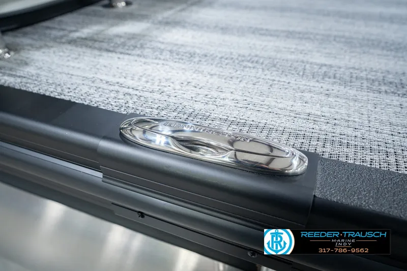 Slide: The Image of 2027 Bennington 22 MSB boat detail with sleek metallic finish and textured surface. - 61