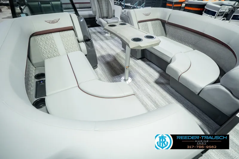 Slide: The Image of Luxurious seating area on a 2027 Bennington 22 MSB pontoon boat with modern design. - 14