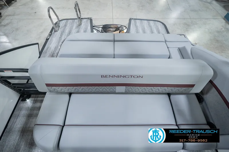 Slide: The Image of 2027 Bennington 22 MSB pontoon boat interior with plush seating and elegant design. - 21