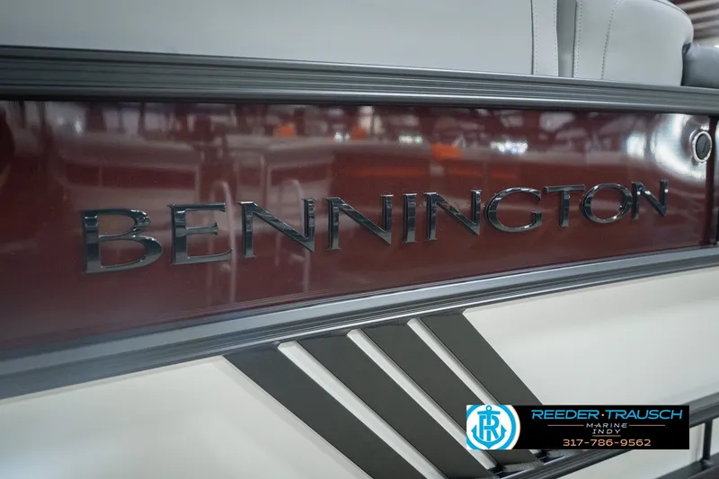 Slide: The Image of 2027 Bennington 22 MSB boat with sleek design and branding details. - 58