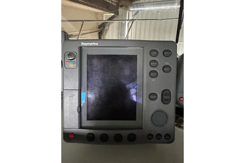 Slide: The Image of Raymarine fishfinder display on 1999 Orca 24 boat dashboard. - 21