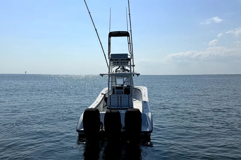 Slide: The Image of 2008 Yellowfin 36 Offshore boat on calm ocean waters under clear sky. - 5