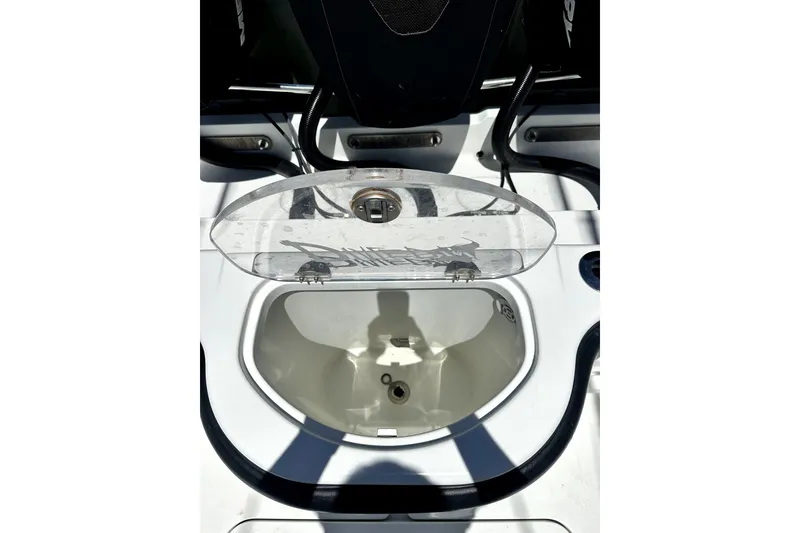 Slide: The Image of 2008 Yellowfin 36 Offshore boat livewell with open lid, showcasing interior details. - 22