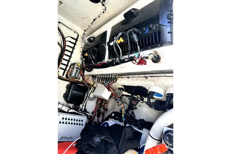 Slide: The Image of Electrical wiring and components inside a 2008 Yellowfin 36 Offshore boat. - 21