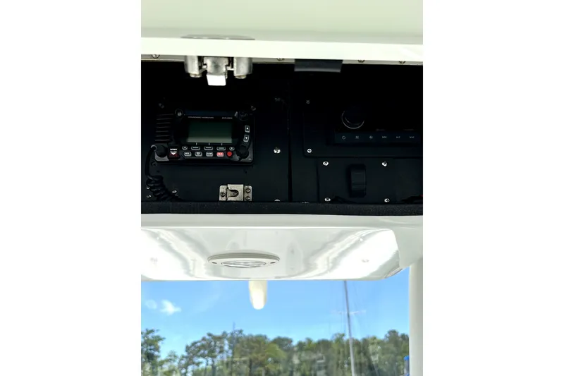 Slide: The Image of 2008 Yellowfin 36 Offshore boat console with radio and control panel. - 15
