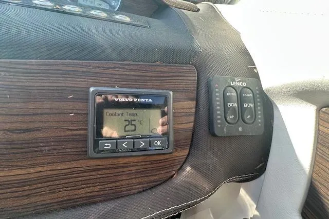 Slide: The Image of 2016 Cobalt A28 dashboard with Volvo Penta display showing 25°C coolant temperature. - 61